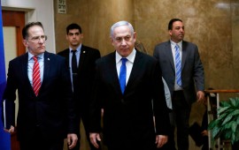 Israeli Prime Minister Benjamin Netanyahu (C) arrives at the weekly cabinet meeting in Jerusalem December 8, 2019.