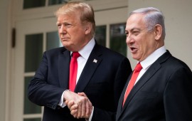U.S. President Donald Trump and Prime Minister of Israel Benjamin Netanyahu shake hands while walking through the colonnade prior to an Oval Office meeting at the White House March 25, 2019 in Washington, DC. 