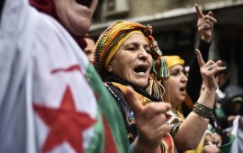 Algerians chant slogans as they take part in an anti-government demonstration in the center of the capital Algiers on January 10, 2020. 