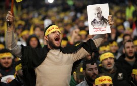 Supporters shout slogans during a rally for Qassem Soleimani in southern suburbs of Beirut, Lebanon, on Jan. 5, 2020. Hezbollah leader Sayyed Hassan Nasrallah urged on Sunday its fighters to attack U.S. soldiers in the region in retaliation for the assassination of Iranian top commander Qassem Soleimani by the United States. (Photo by Bilal Jawich/Xinhua via Getty) (Xinhua/ via Getty Images)