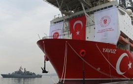 A picture taken at the port of Dilovasi, outside Istanbul, on June 20, 2019 shows the drilling ship 'Yavuz' scheduled to search for oil and gas off Cyprus, next to a warship.