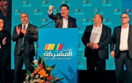 Ayman Odeh (C), leader of the Hadash party that is part of the Joint List alliance, gives an address with other alliance leaders at their electoral headquarters in Israel's northern city of Shefa-Amr on March 2, 2020, after polls officially closed.