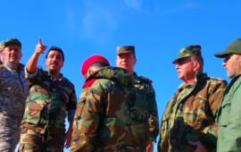 Maj. Gen. Khader (center) tours regime positions near Shoula alongside Feras Jeham (pointing) commander of the Deir ez-Zor NDF and Republican Guard officers.