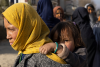 Photo by Paula Bronstein /Getty Imageshttps://www.mei.edu/sites/default/files/2022-03/To%20Save%20Afghanistan%2C%20Try%20Differently.pdf