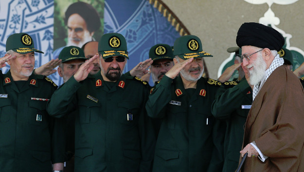 Iranian Guard troops salute 