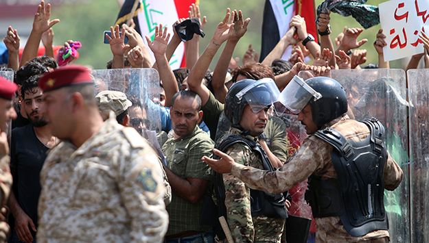 Iraqi citizens protest near Basra