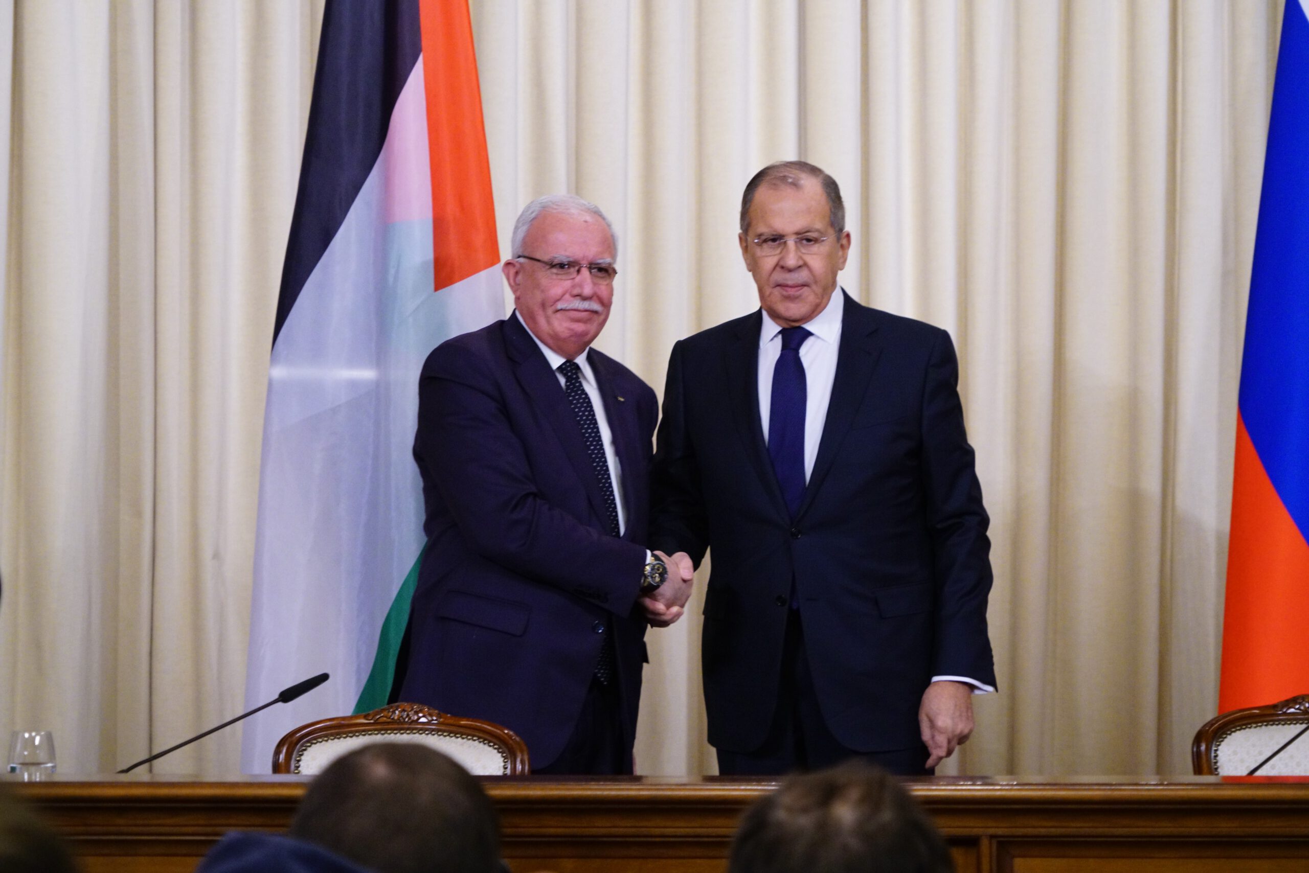 Russian Foreign Minister Sergei Lavrov (R) shakes hand with Palestinian Foreign Minister Riyad al-Malki (L) as they pose for a photo ahead of their press conference in Moscow, Russia on December 21, 2018.