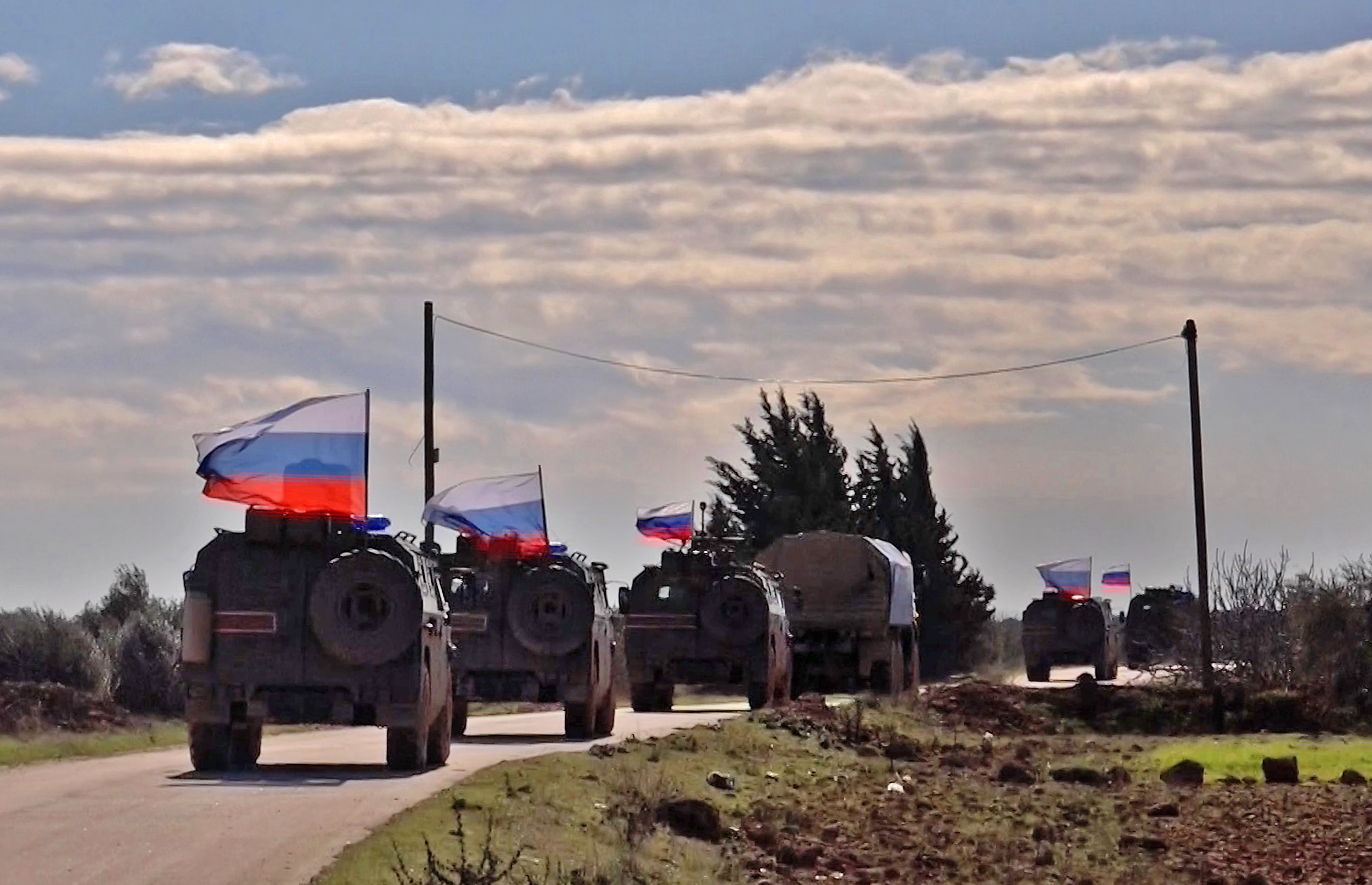An image grab taken from AFP TV on January 17, 2019, shows a Russian army vehicles on patrol in the area of Arimah, just west of Manbij.