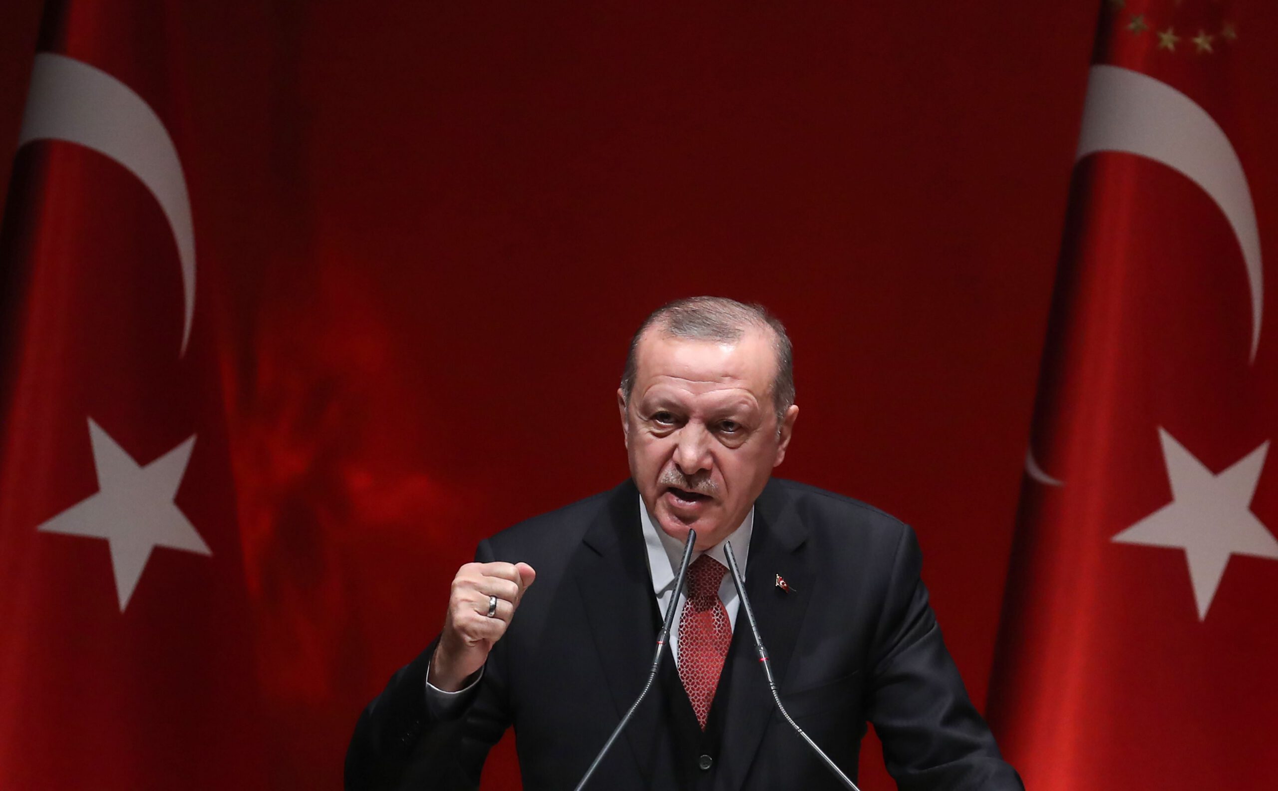Turkish President Recep Tayyip Erdogan addresses a meeting of provincial election officials at the headquarters of his ruling AK Party in Ankara on January 29, 2019.