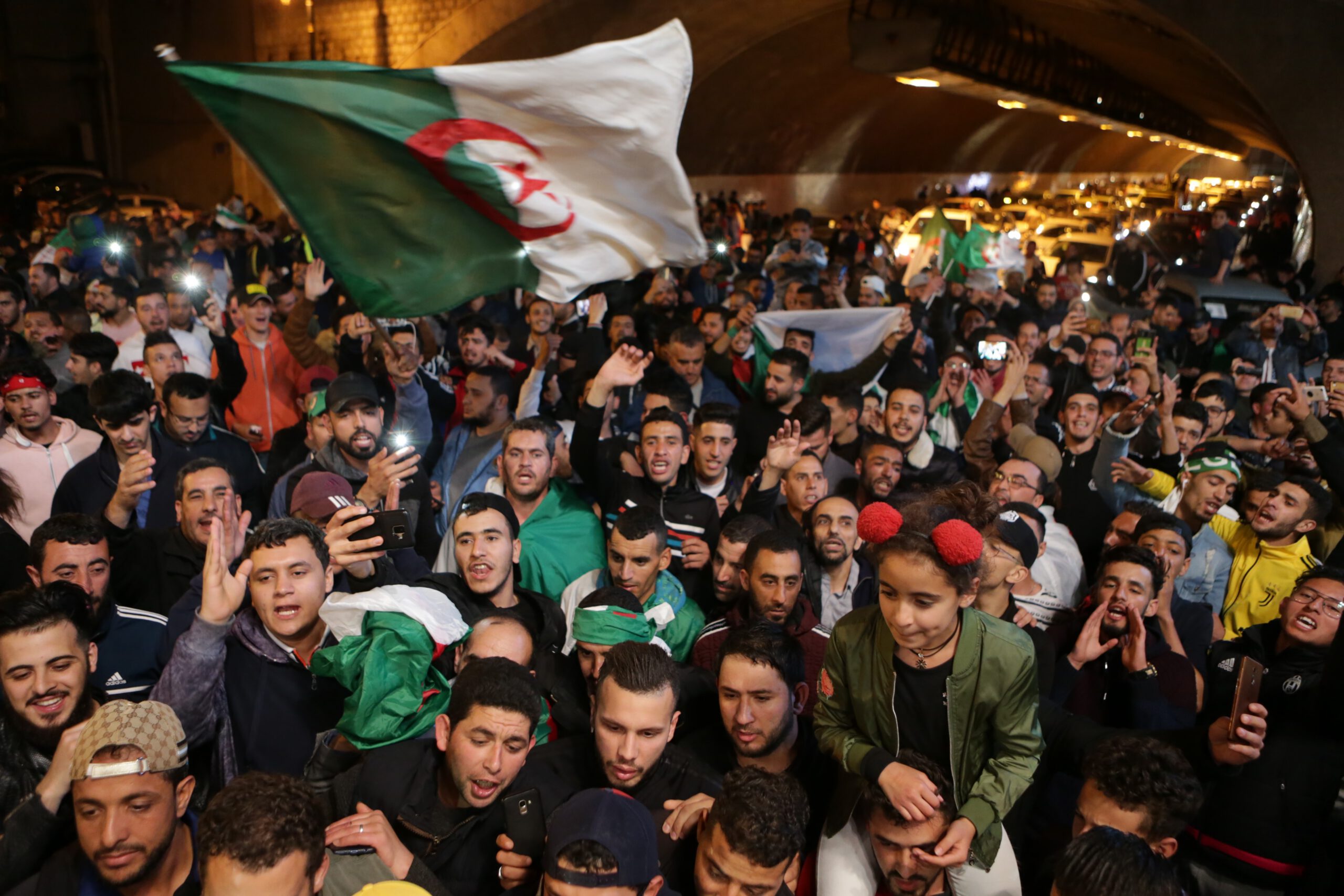 Hundreds of people celebrate during a demonstration after the resignation of Algerian President Abdelaziz Bouteflika, on April 02, 2019 in Algiers, Algeria.