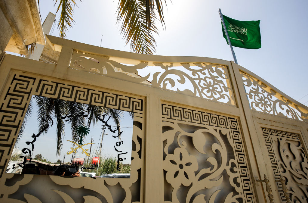 Saudi flag flying over the gatehouse to the new Saudi consulate headquarters in the high security 