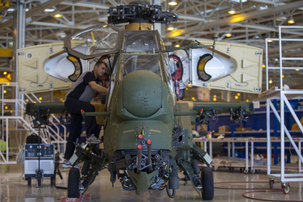 Staff of Turkish Aerospace Industries Inc. works on a helicopter in Ankara, Turkey on July 13, 2018. 