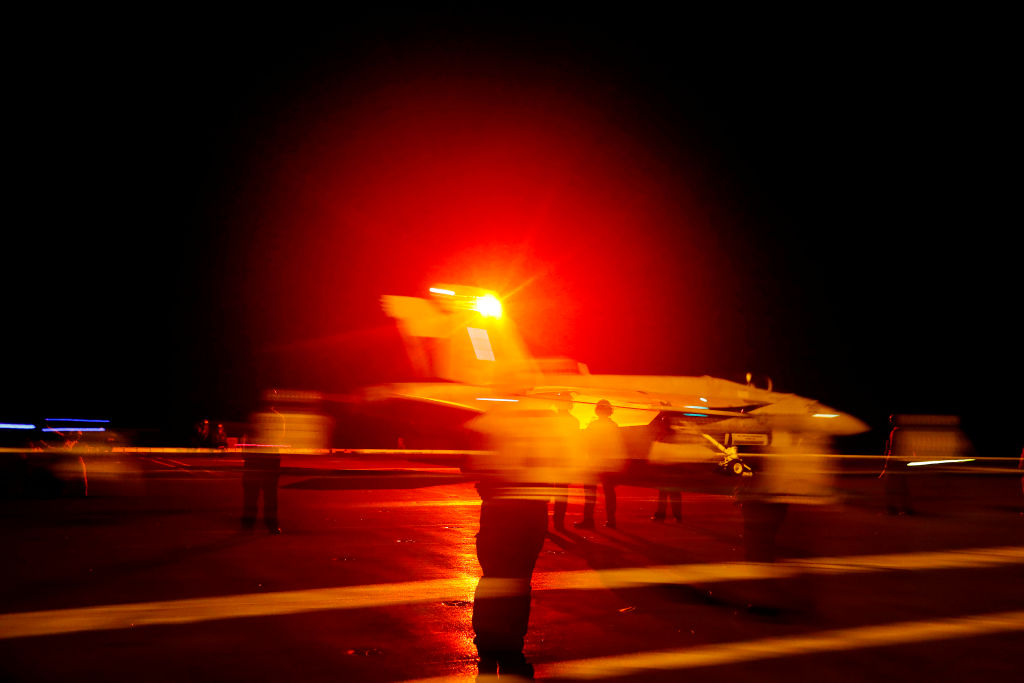 An F/A-18E Super Hornet from Strike Fighter Squadron 86 launches from the flight deck of the Nimitz-class aircraft carrier USS Abraham Lincoln May 10, 2019 in the Red Sea. 