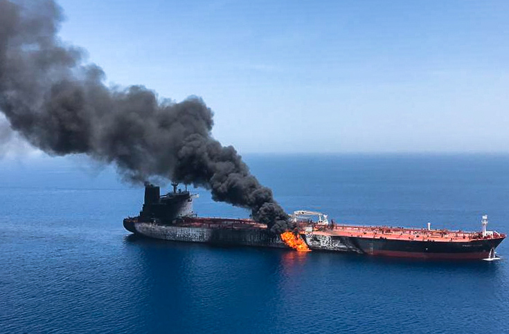 This photo reportedly shows fire and smoke billowing from Norwegian owned Front Altair tanker said to have been attacked in the waters of the Gulf of Oman