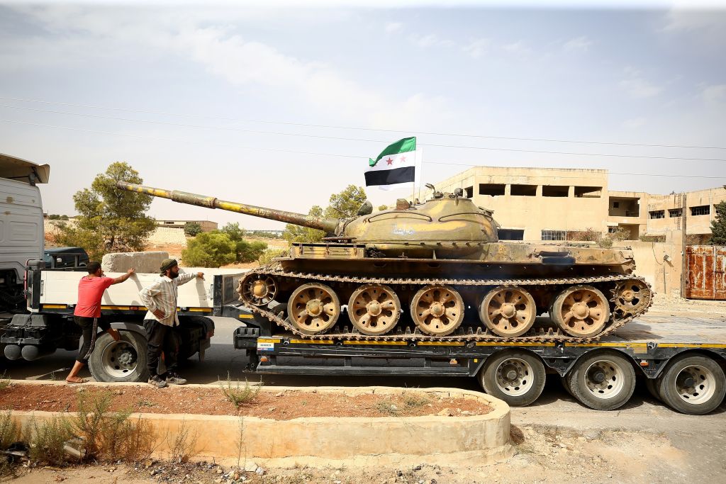 Heavy armoured vehicles of Syrian opposition forces are being withdrawn from Syria's Idlib to complete the establishment of the disarmament field due to the Sochi Agreement, agreed by Turkey and Russia, on October 08, 2018. (Photo by Gokhan Balci/Anadolu Agency/Getty Images)