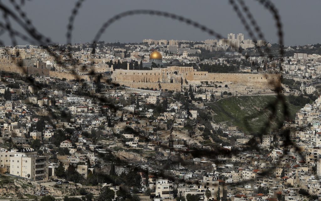 A picture taken on February 1, 2019 from Jabel Mukaber, a Palestinian neighbourhood in Israeli-occupied East Jerusalem shows the Dome of the Rock mosque (golden dome) and al-Aqsa Mosque (silver dome) at the al-Aqsa Mosque compound in Jerusalem's Old City. 