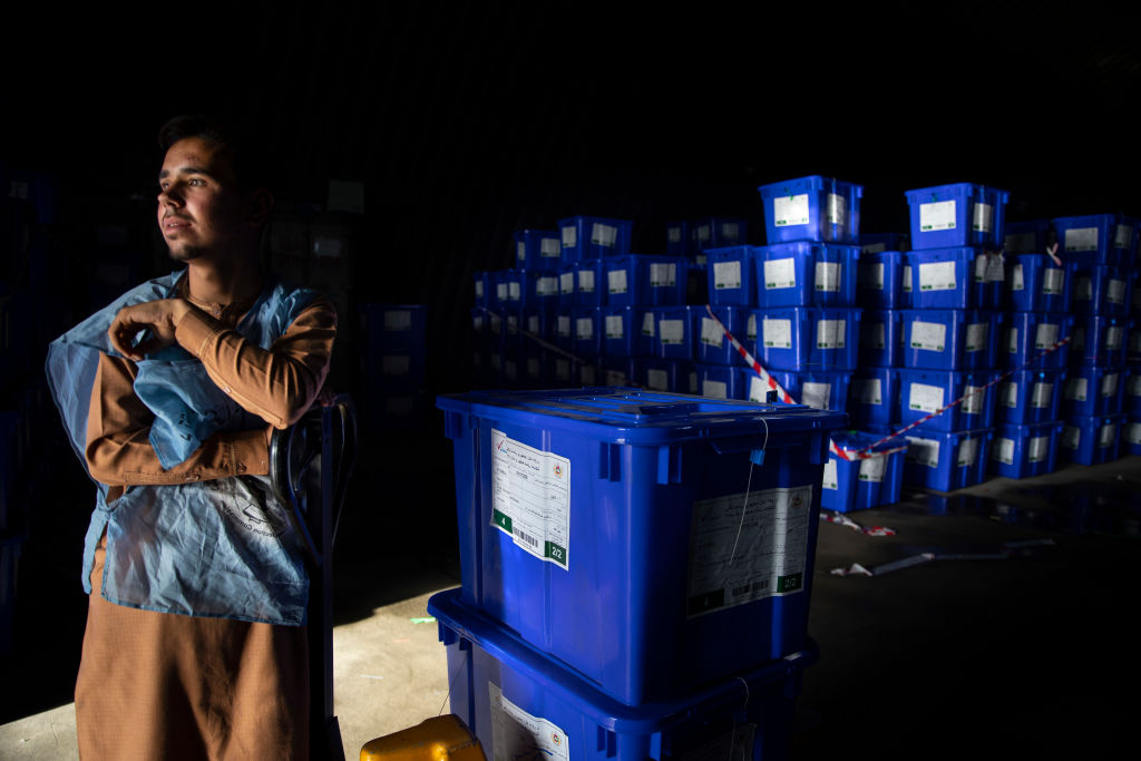  Afghan workers move ballot boxes to trucks getting ready for the Presidential elections in five days in Kabul, Afghanistan on September 23, 2019. 