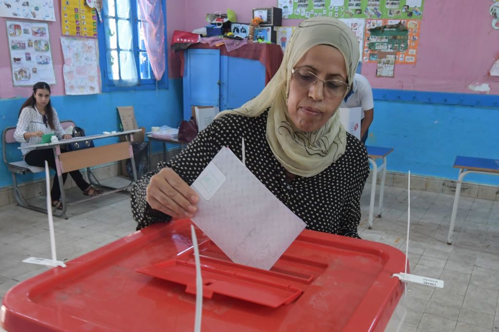 A Tunisian voter casts his ballot for presidential election at a polling station in La Marsa on the outskirts of the capital Tunis, on September 15, 2019.