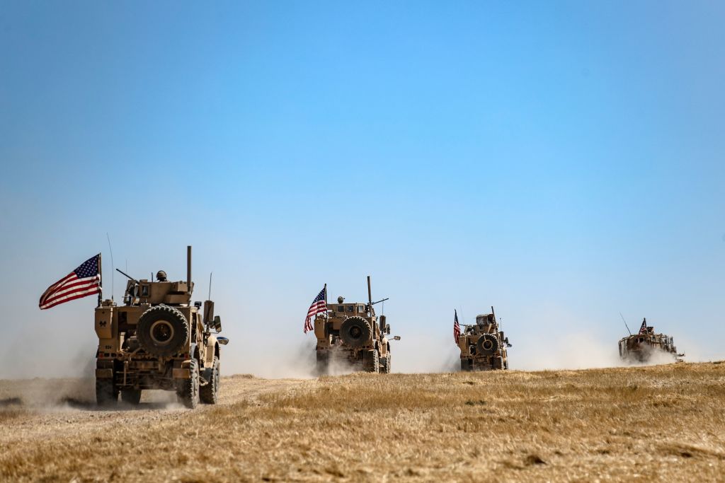 A US military convoy takes part in joint patrol with Turkish troops in the Syrian village of al-Hashisha on the outskirts of Tal Abyad town along the border with Turkish troops, on September 8, 2019.