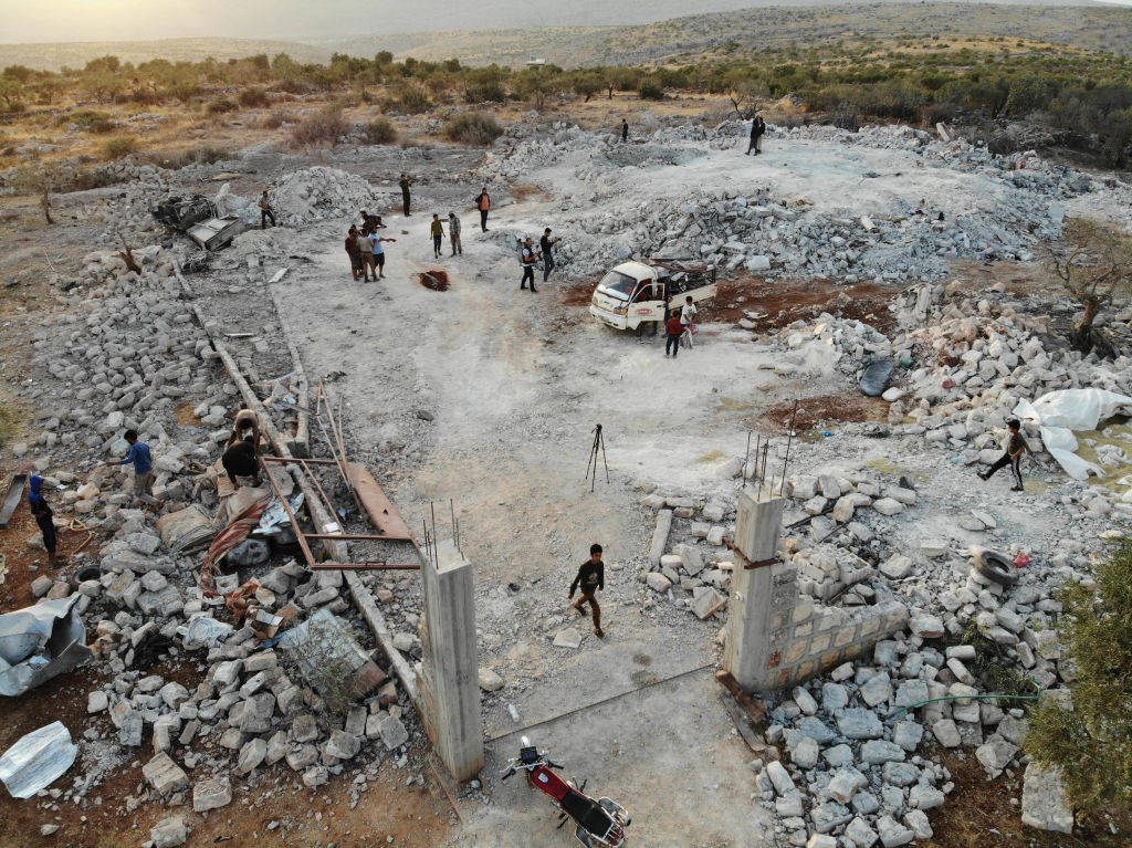 An aerial view taken on October 27, 2019 shows the site that was hit by helicopter gunfire which reportedly killed nine people near the northwestern Syrian village of Barisha in the Idlib province along the border with Turkey, where 
