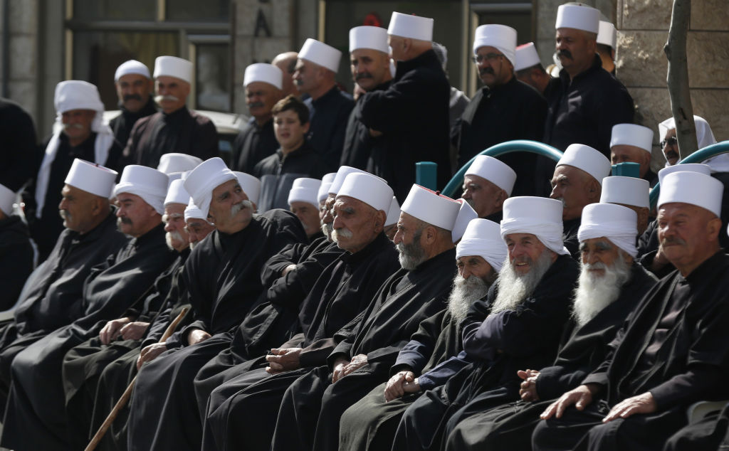 Druze residents of the Golan Heights rally in the village of Majdal Shams on February 14, 2018 to protest against the 1981 Israeli annexation law of the strategic plateau which the Israel captured from Syria during the 1967 Arab-Israeli war.