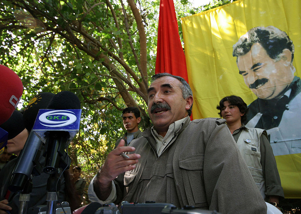 Murat Karyilan, co-leader of the Kurdistan Workers Party (PKK) gestures as he speaks 30 September 2006 during a press conference in the foothills of the Qandil Mountains.