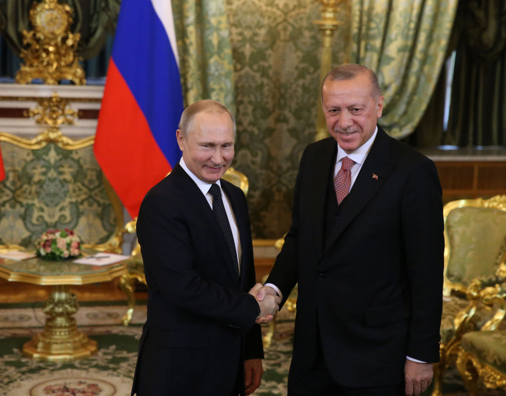  Russian President Vladimir Putin (L) greets Turkish President Recep Tayyip Erdogan (R) during their bilateral talks at the Grand Kremlin Palace on April 8, 2019 in Moscow, Russia.
