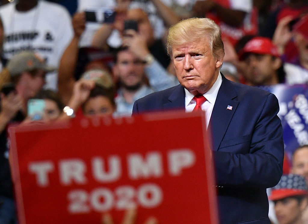 US President Donald Trump looks on during a rally at the Amway Center in Orlando, Florida to officially launch his 2020 campaign on June 18, 2019.