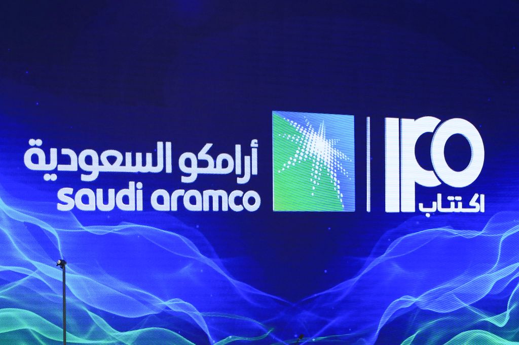 A picture taken on November 3, 2019 shows a sign of Saudi Aramco's initial public offering (IPO) during a press conference by the state company in the eastern Saudi Arabian region of Dhahran.