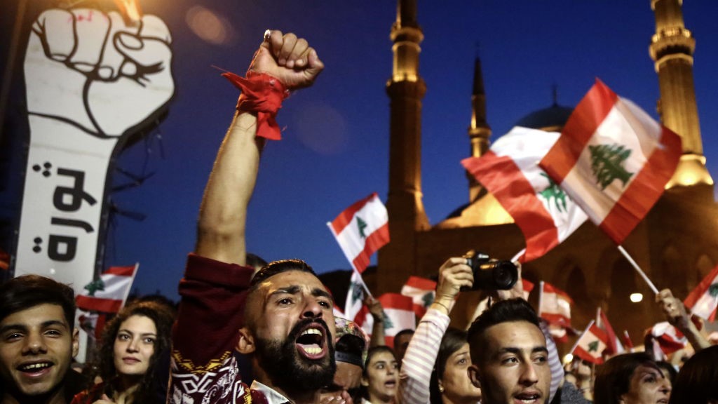Anti-government activists take part in a protest in downtown Beirut, demonstrations across Lebanon entered its 2nd months.