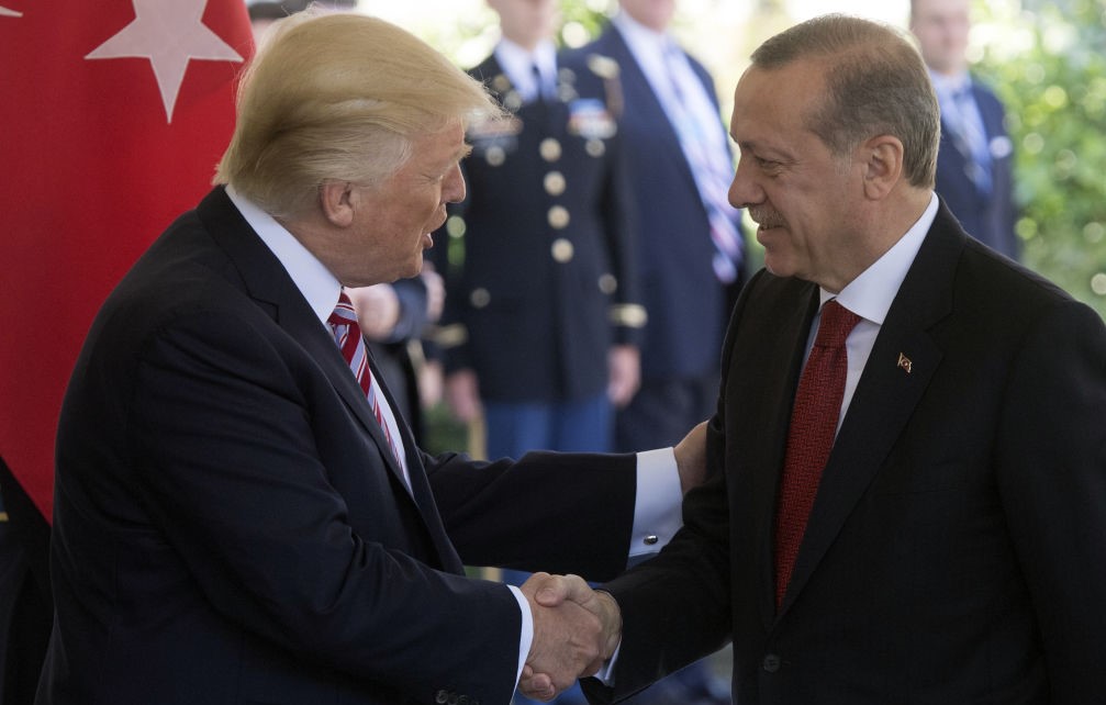 US President Donald Trump shakes hands with Turkish President Recep Tayyip Erdogan as he arrives for meetings at the White House in Washington, DC, May 16, 2017.