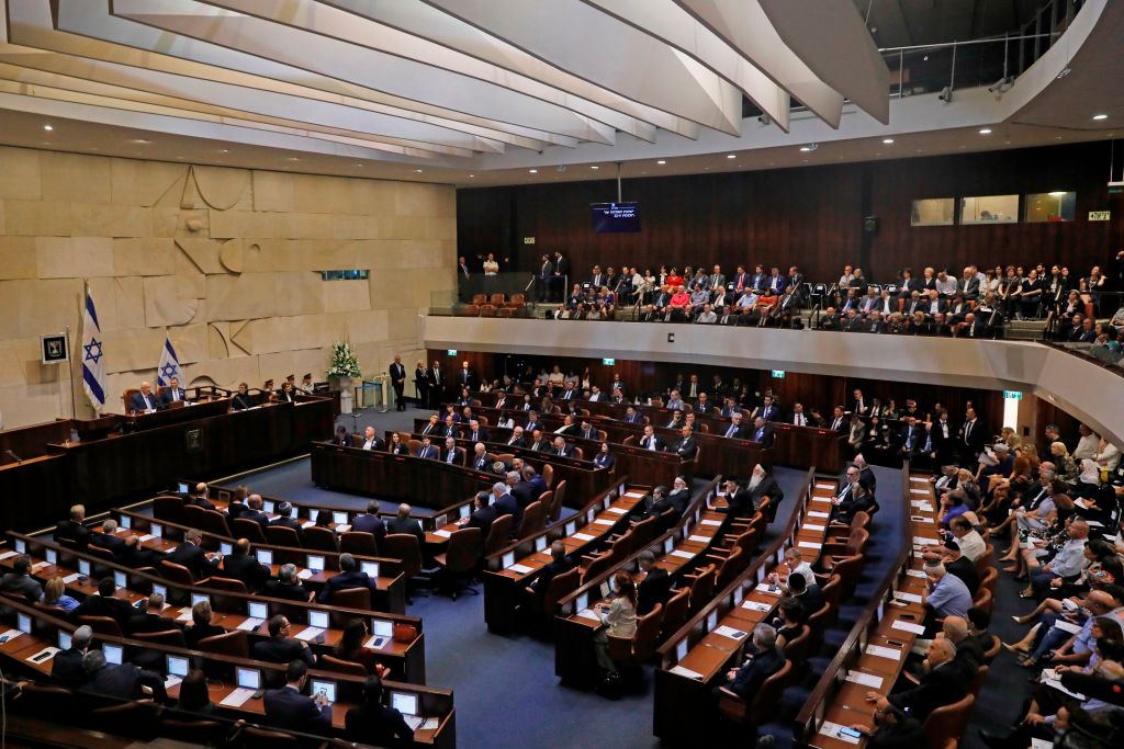 A picture taken on October 3, 2019 shows a general view of the plenum during the swearing-in ceremony at the Knesset in Jerusalem. - Israel's parliament was sworn in today without a new government formed as a deadlocked general election left Netanyahu scrambling to find a path to extend his long tenure in power.