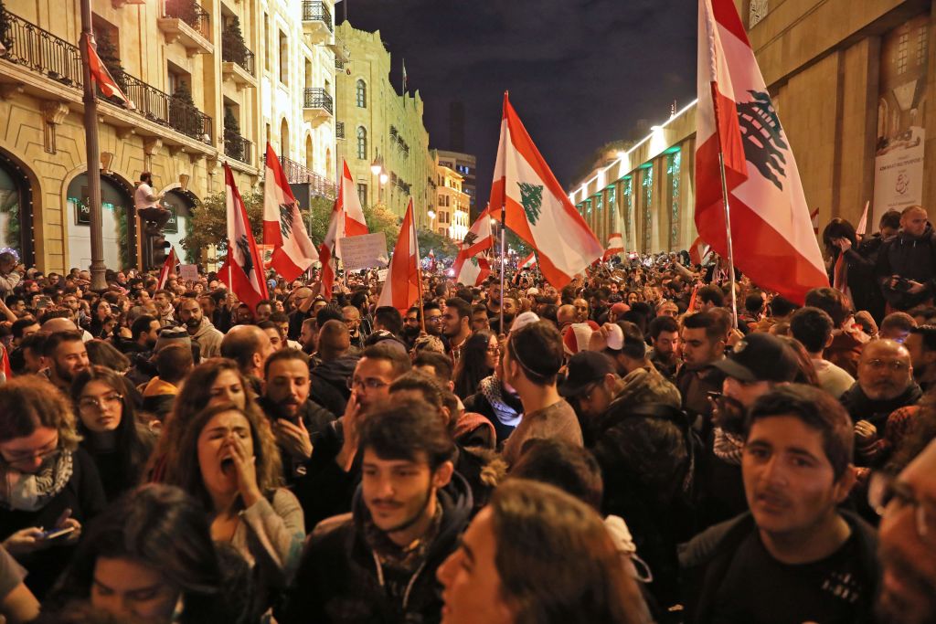  Lebanese demonstrators south slogans in the capital Beirut on December 15, 2019.