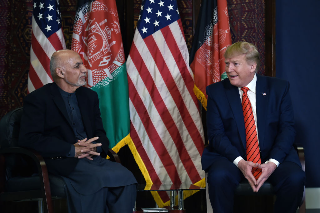 US President Donald Trump holds a bilateral meeting with Afghan's President Ashraf Ghani at Bagram Air Field during a surprise Thanksgiving day visit, on November 28, 2019 in Afghanistan.