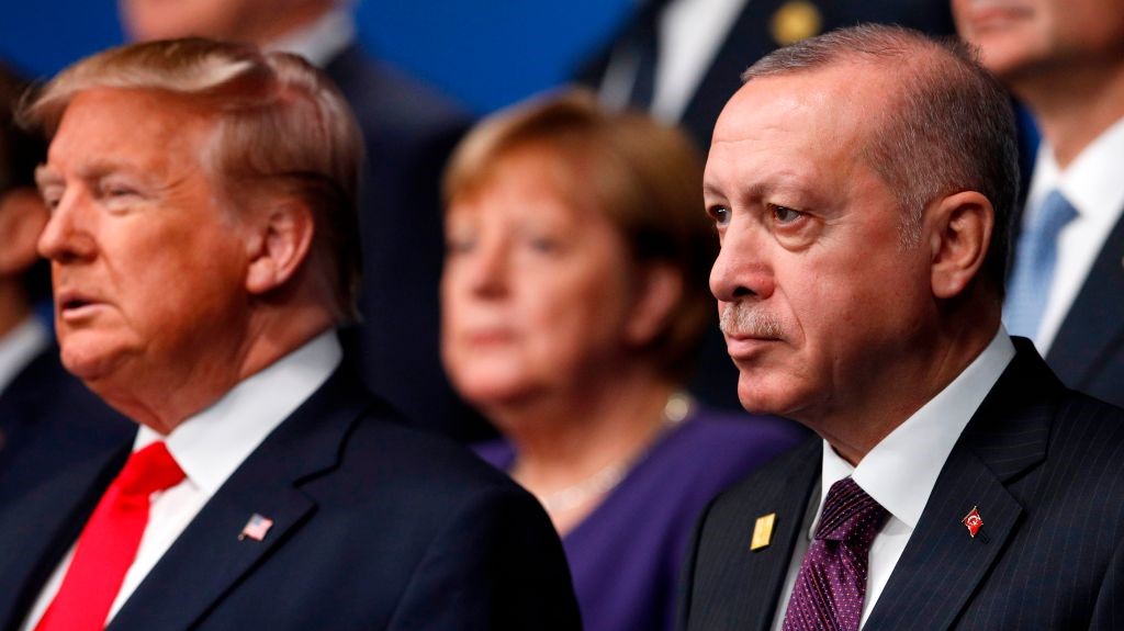 US President Donald Trump (L) and Turkey's President Recep Tayyip Erdogan (R) pose for the family photo at the NATO summit at the Grove hotel in Watford, northeast of London on December 4, 2019.