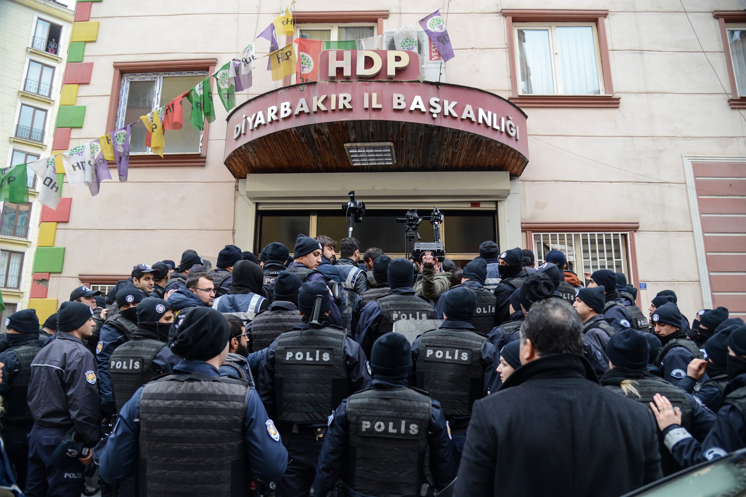 Turkish anti riot police officers block People' Democracy Party's (HDP) headquarter as HDP members call a protest against Turkey's 