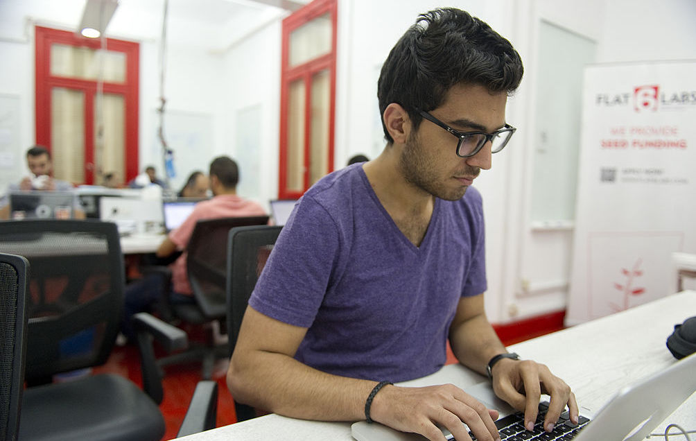Social entrepreneur, Amr Sobhy, CEO of Pushbots, works in the office space at Flat6Labs on November 7, 2012 in Cairo, Egypt. 