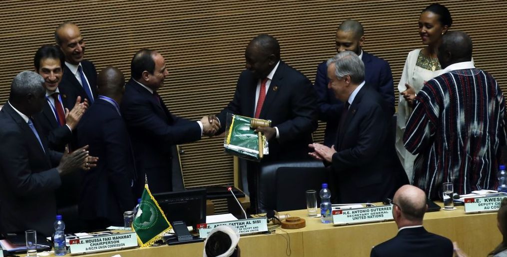 South African President Cyril Ramaphosa (5th R) assumes gavel for a year-long African Union (AU) presidency from the outgoing Abdel-Fattah El-Sisi (5th L), the Egyptian president, during the 33rd African Union Heads of State Summit in Addis Ababa, Ethiopia on February 09, 2020. 
