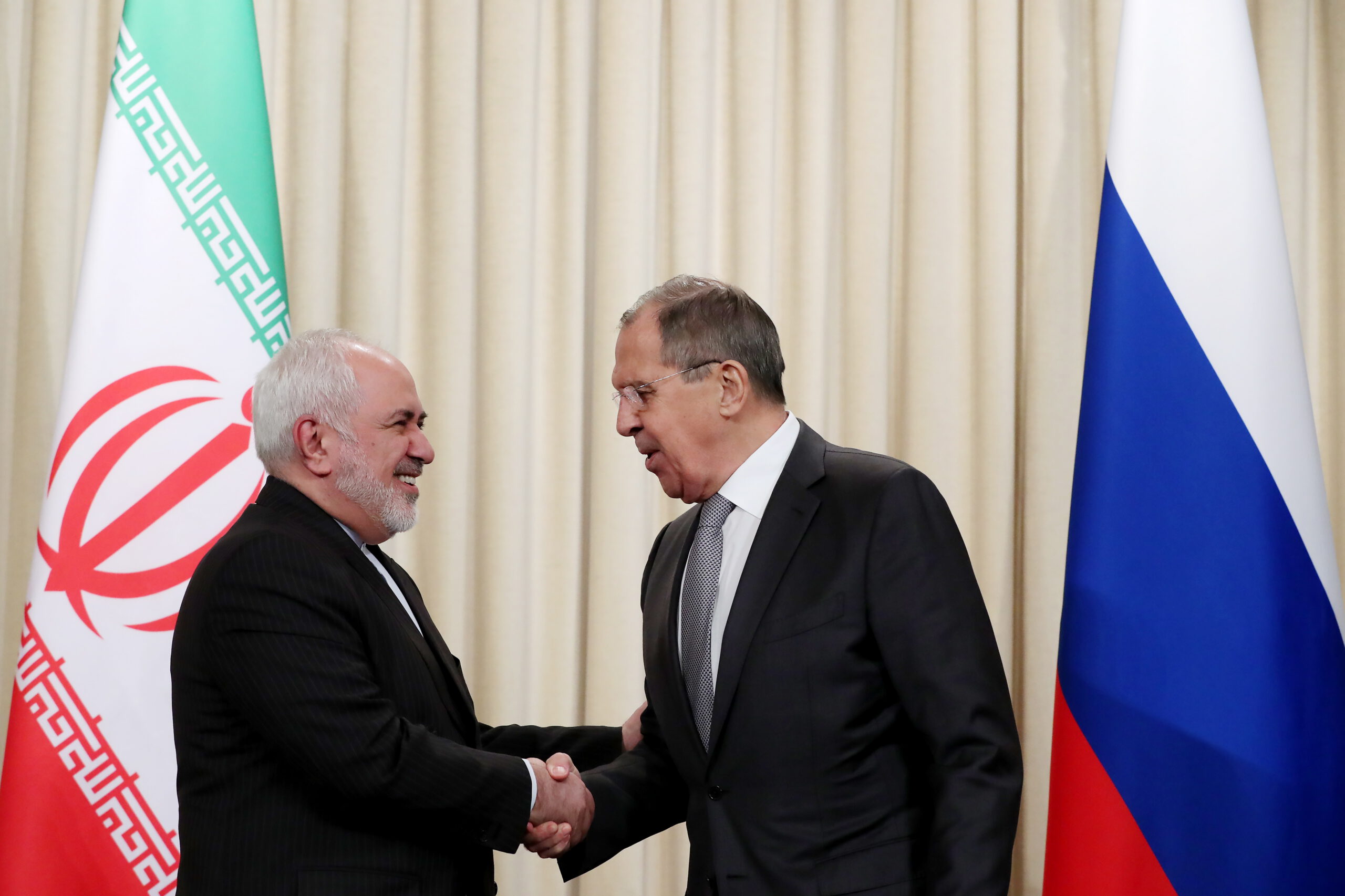 MOSCOW, RUSSIA - DECEMBER 30, 2019: Iran's Foreign Minister Mohammad Javad Zarif (L) and Russia's Foreign Minister Sergei Lavrov shake hands during a press conference following their meeting at the Russian Foreign Ministry's Reception House in Spiridonovka Street. Vladimir Gerdo/TASS (Photo by Vladimir GerdoTASS via Getty Images)