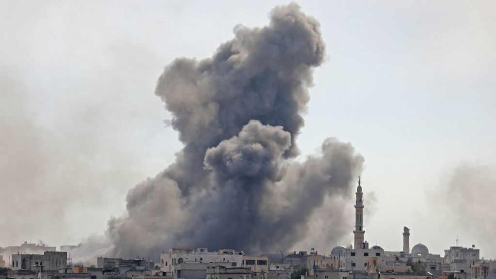 This picture taken on February 3, 2020 shows smoke plumes billowing in the Syrian village of al-Nayrab, about 14 kilometres southeast of the city of Idlib in the northwestern Idlib province, during bombardment by Syrian government forces and its allies.