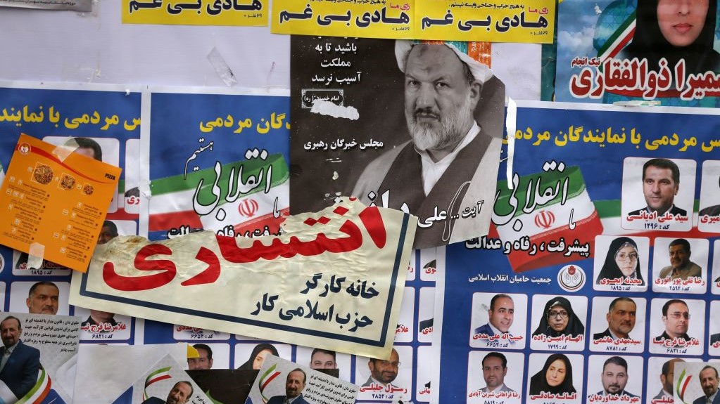 Iranian electoral posters and fliers are pictured on the last day of election campaign in Tehran on February 19, 2020.
