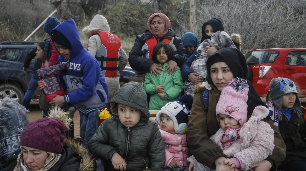  Irregular migrants escaped from civil war in Syria, who want to proceed to Europe, are seen after they came with a boat at a shore in Lesbos Island on Greece on February 28, 2020.