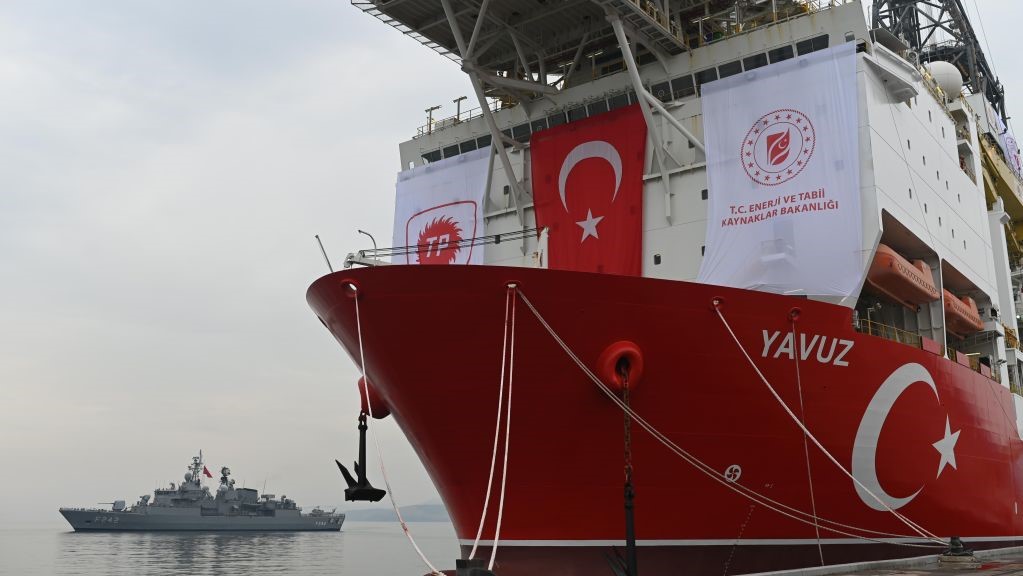 A picture taken at the port of Dilovasi, outside Istanbul, on June 20, 2019 shows the drilling ship 'Yavuz' scheduled to search for oil and gas off Cyprus, next to a warship.