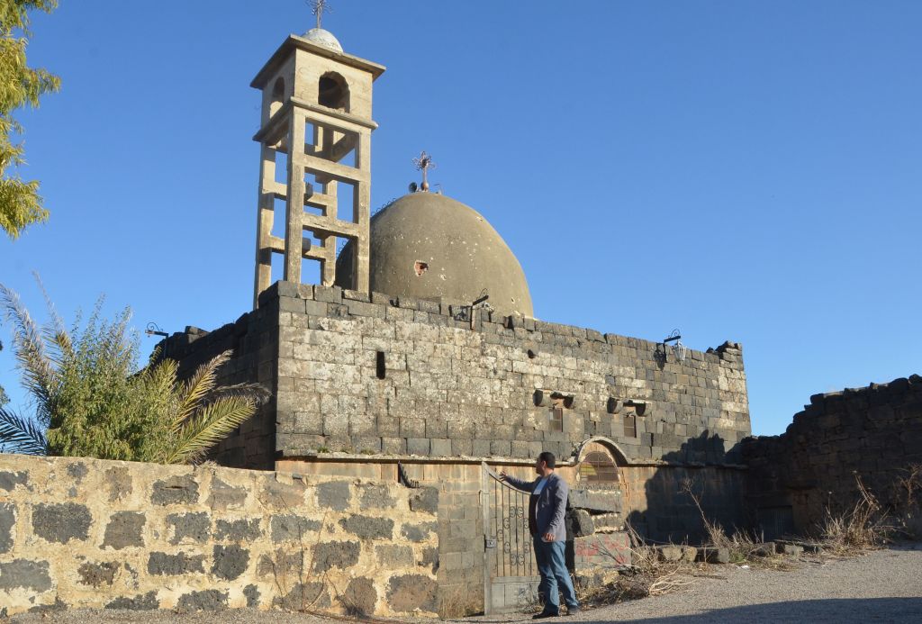 A picture shows the old church of Sayyidet al-Beshara in Shaqra town in the southern Syrian province of Daraa on December 22, 2019. - Less than 10 kilometres (six miles) away lies the mainly Christian town of Shaqra, emptied of most of its Christian residents after a spate of attacks by rebels and jihadists during the conflict. Such attacks have stopped since the area came back under regime control, but very few Christian families remain. (Photo by MAHER AL MOUNES / AFP) (Photo by MAHER AL MOUNES/AFP via Ge