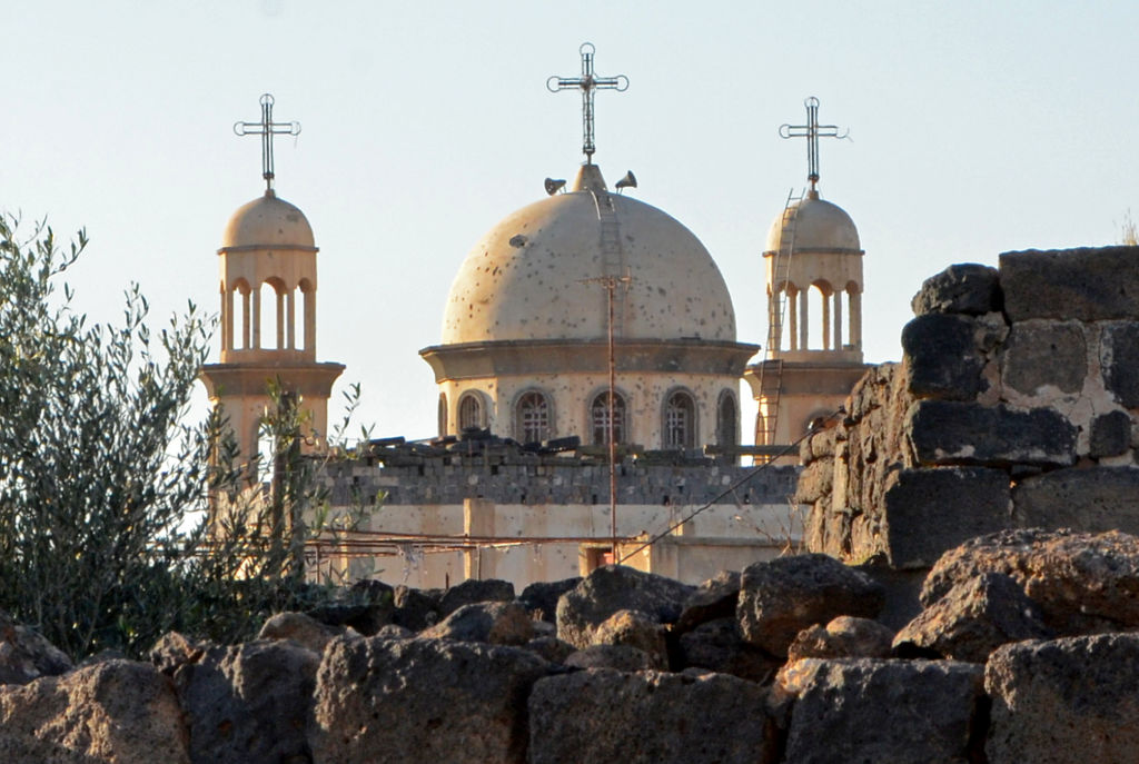 A picture shows the new church of Sayyidet al-Beshara in Shaqra town in the southern Syrian province of Daraa on December 22, 2019. - Less than 10 kilometres (six miles) away lies the mainly Christian town of Shaqra, emptied of most of its Christian residents after a spate of attacks by rebels and jihadists during the conflict. Such attacks have stopped since the area came back under regime control, but very few Christian families remain. (Photo by MAHER AL MOUNES / AFP) (Photo by MAHER AL MOUNES/AFP via Ge