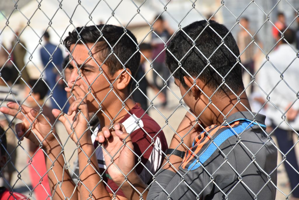 Iraqi civilians, who fled from Daesh controlled Hawija district of Kirkuk, are seen at Daqouq tent city southern Kirkuk, Iraq on November 12, 2017. (Photo by Ali Mukarrem Garip/Anadolu Agency/Getty Images)