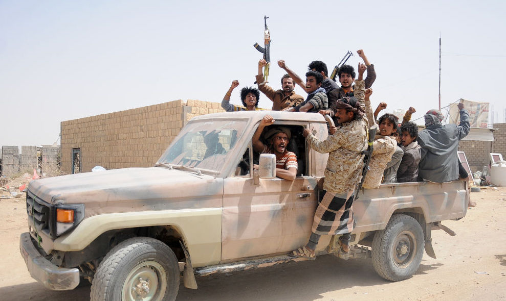 Houthi fighters gather on a vehicle in a recently captured area following heavy fighting with forces loyal to the internationally recognized government on March 2, 2020 in Al-Jawf province, Yemen. 