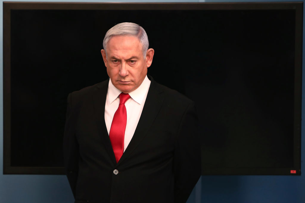 Israeli Prime Minister Benjamin Netanyahu arrives for a speech at his Jerusalem office on March 14, 2020, regarding the new measures that will be taken to fight the Corona virus in Israel.