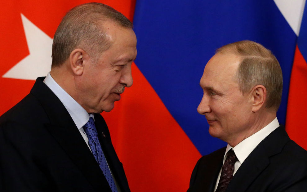 Russian President Vladimir Putin and Turkish President Recep Tayyip Erdogan greet each other during their talks at the Kremlin on March 5, 2020 in Moscow, Russia. Erdogan is having a one day visit to Russia to discuss the war conflcit in Syria. 