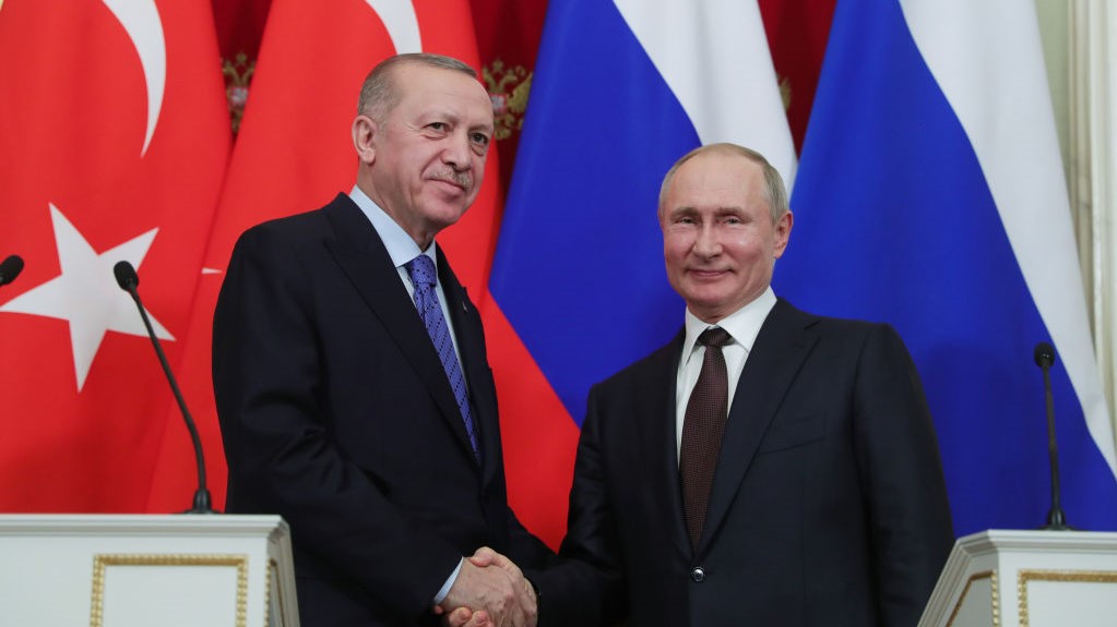 President of Turkey Recep Tayyip Erdogan (L) and President of Russia Vladimir Putin (R) shake hands at the end of a joint news conference following an inter-delegation meeting at Kremlin Palace in Moscow, Russia on March 5, 2020.